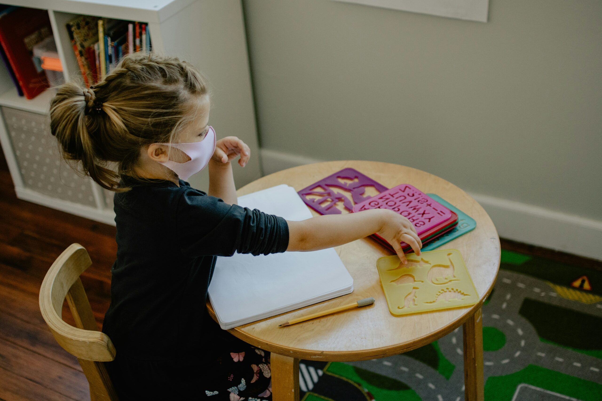 A classroom setting showcasing students using tablets for reading activities supported by dyslexia-friendly apps.