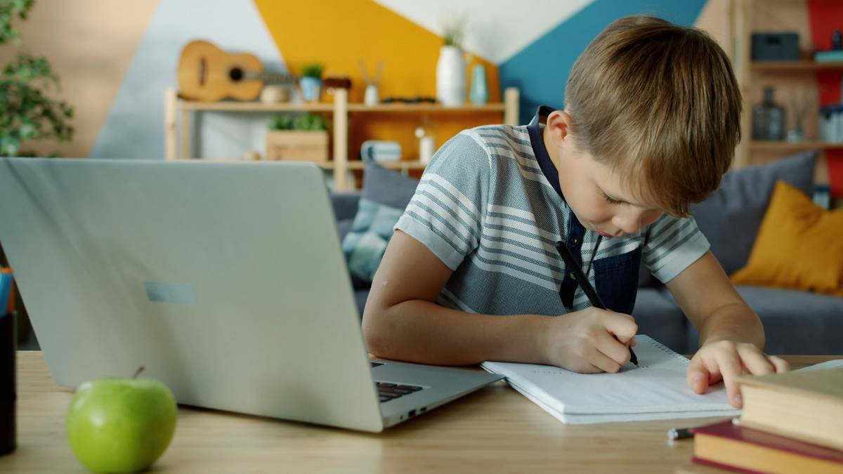 Child using tablet with support dyslexia apps sound features highlighted on screen