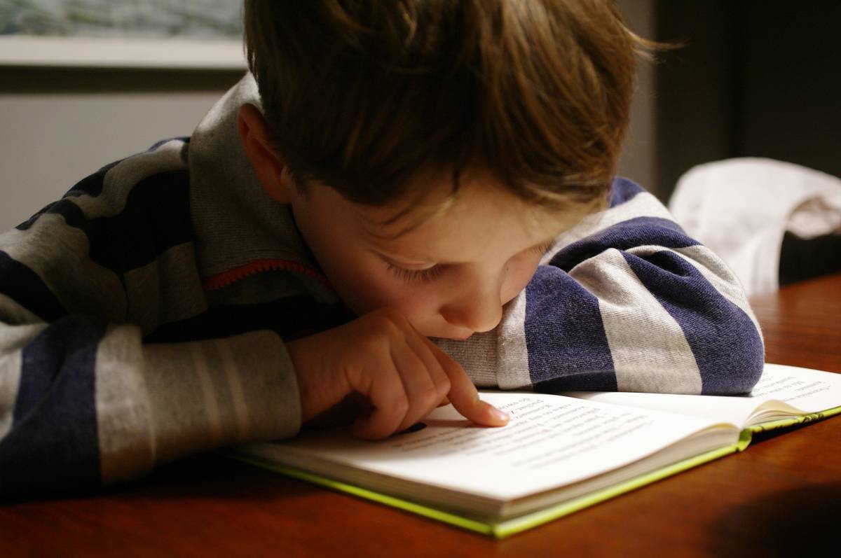 Colorful tablet showing support dyslexia apps kids use during reading practice at home
